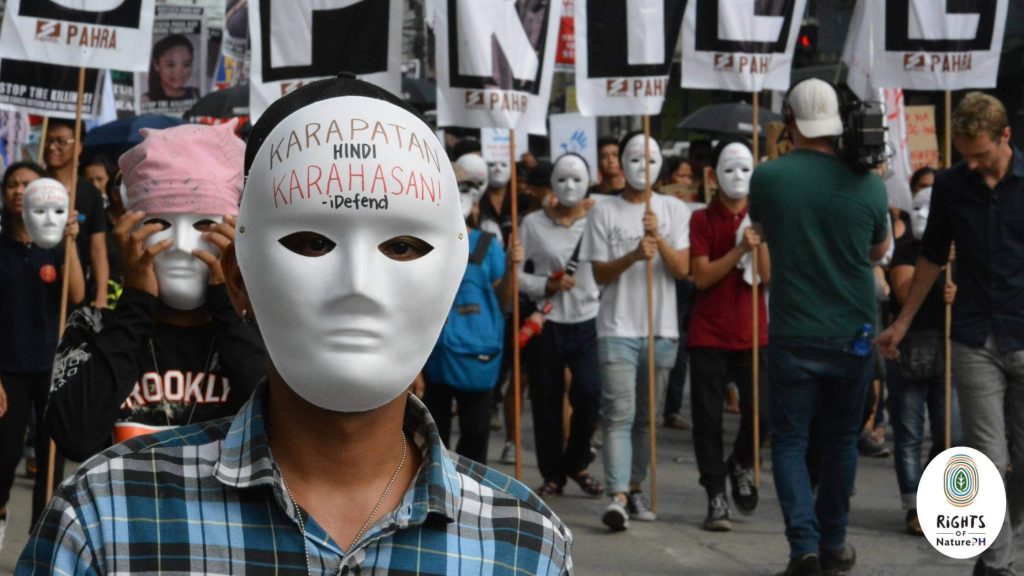 human rights protesters holding posters